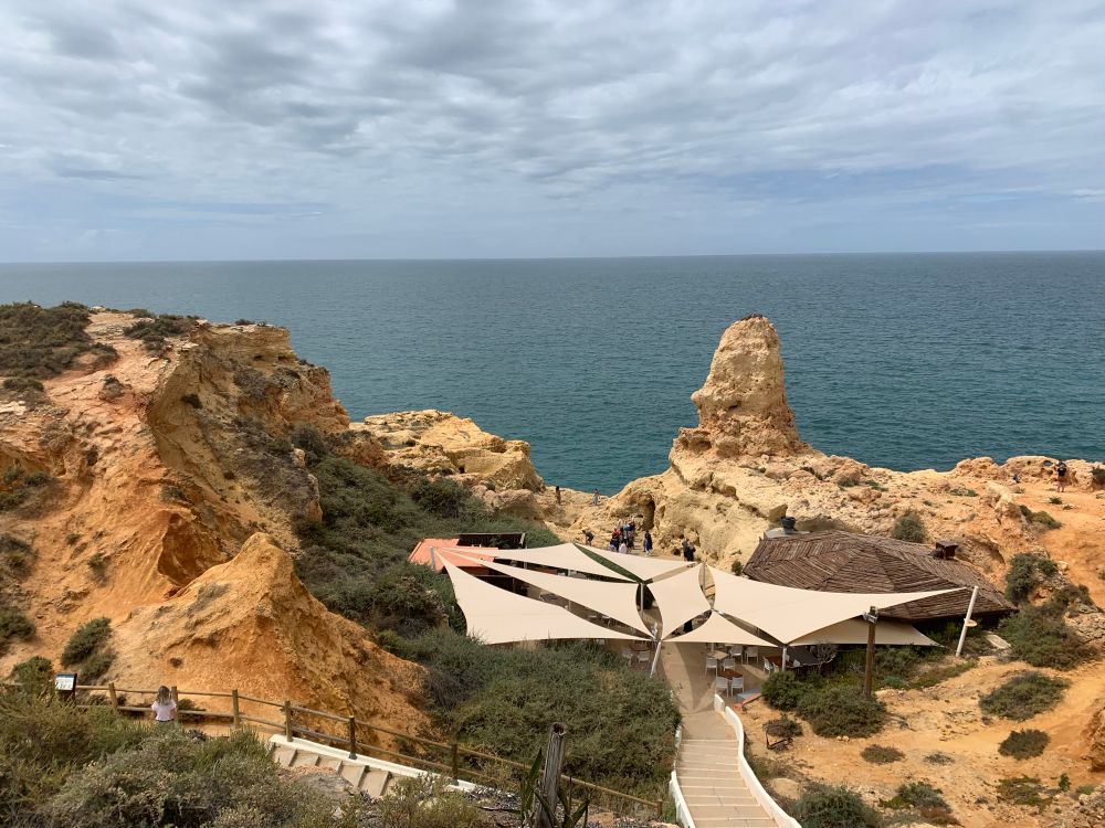 Cafe amongst the sandstone and limestone cliffs in the Algarve, Southern Portugal. 
