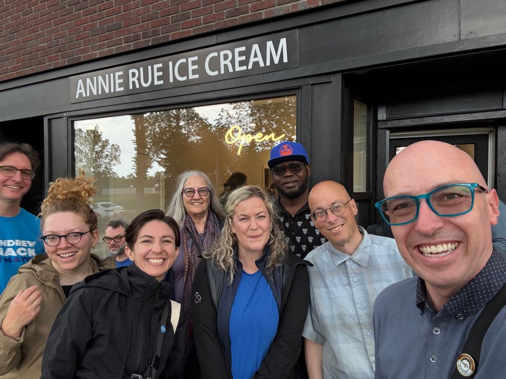 Andrew with 7 other people standing in front of Annie Rue Ice Cream.
