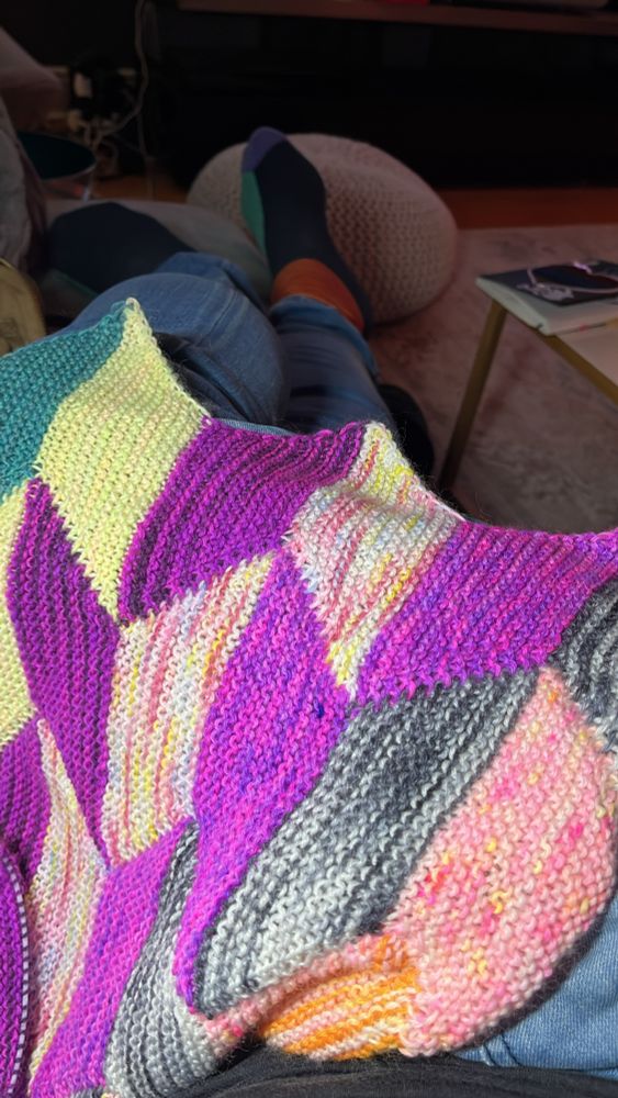 Close up of the 4sided shapes that make up the design of the scarf 