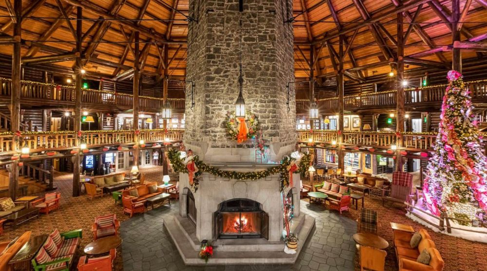 Main public room in Le Château Montebello decorated for Christmas. The building is the world's largest "log cabin".