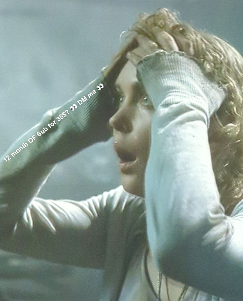 A screenshot from the 2006 movie "Silent Hill" with added text across the womans arm with the words "12 month OF Subscription for $35? 👀 DM me 👀"