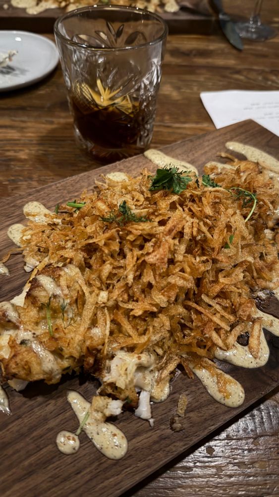 Lump Crab Crusted Great Lakes Whitefish with
horseradish Cream, crispy potato, herb salad and lemon