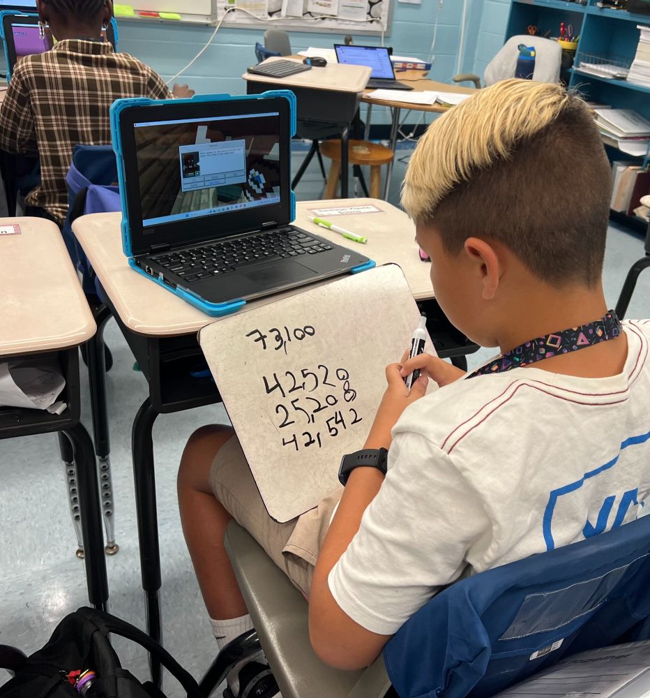 Minecraft Education: Students solve place value, rounding and comparison questions in-game.