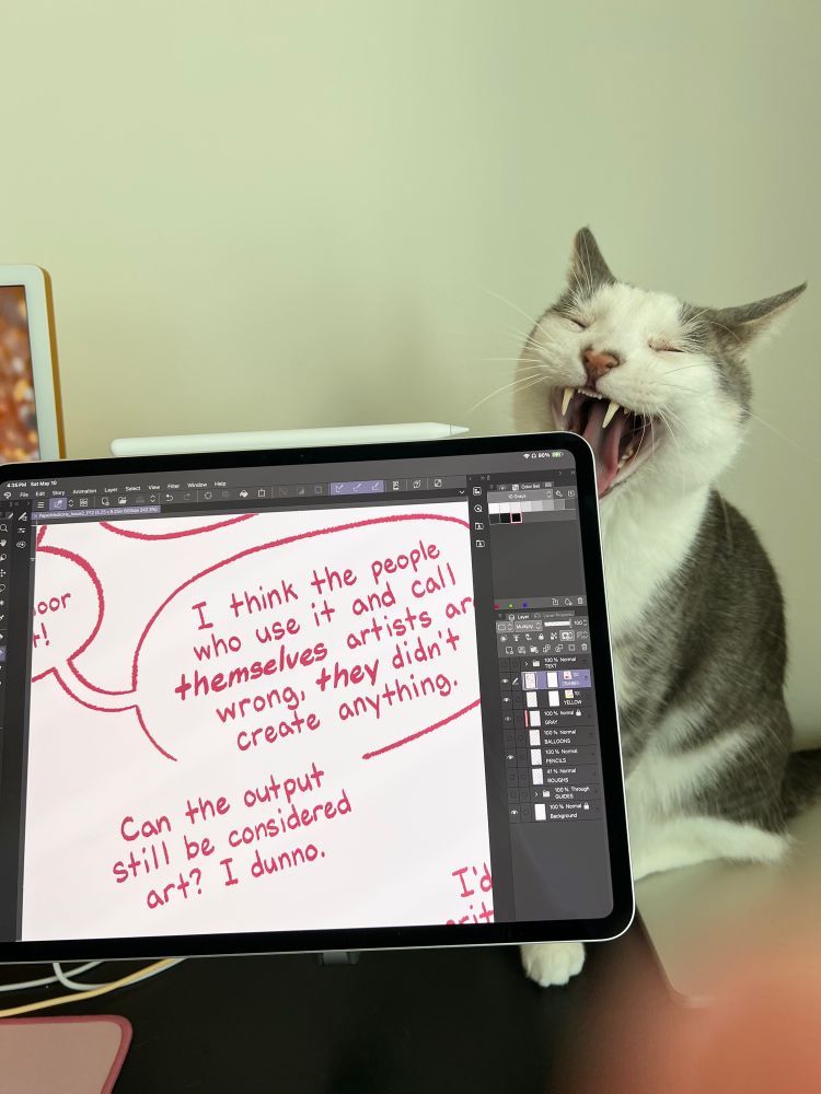 An iPad showing a zoomed-in drawing in Clip Studio Paint. Sitting on the desk behind the iPad is a yawning cat, Salamander. 