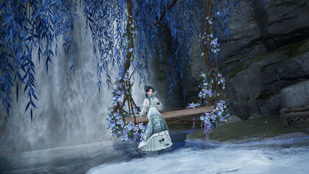 nikki on a swing on a beautiful tree next to waterfall