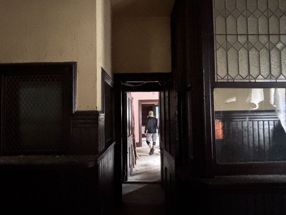 View into corridor with ticket office and newspaper stand
