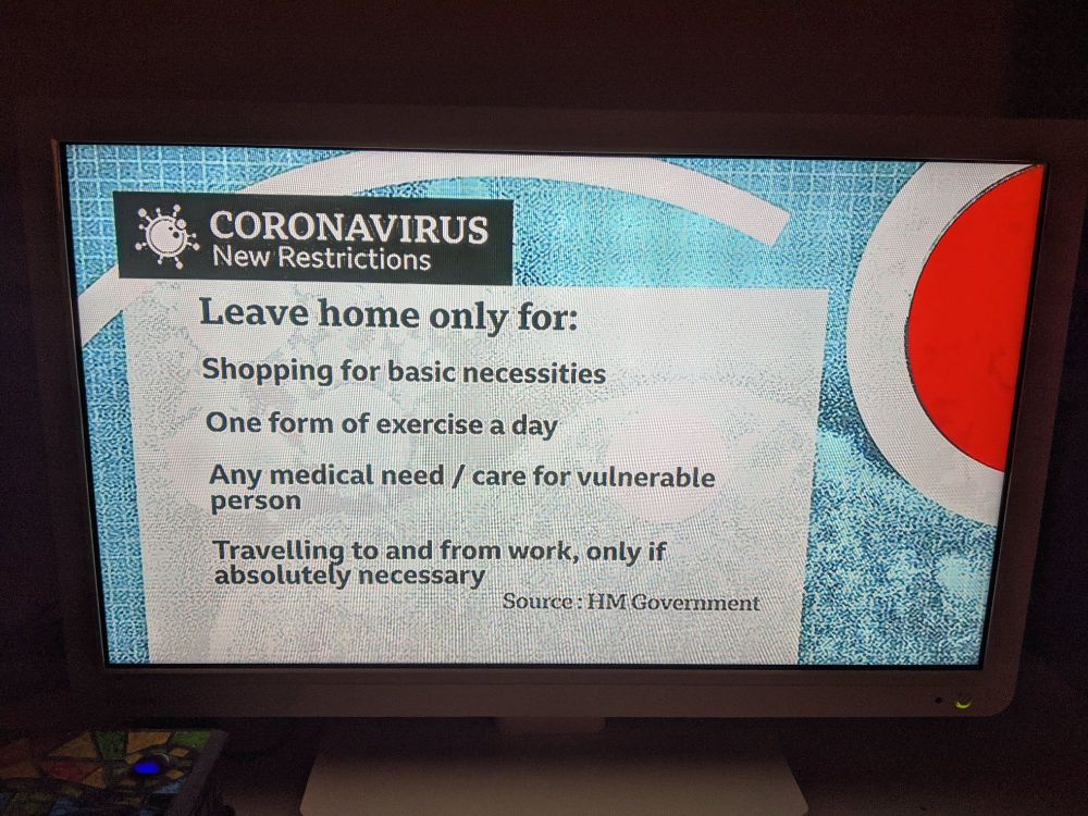 Photo of a TV screen showing the UK COVID lockdown announcement from five years ago.