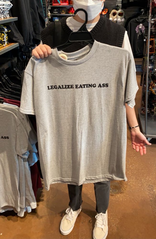 My twink best friend fighting for his life in a Spencer’s but identifying with some of the merchandise regardless