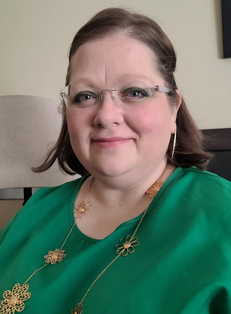 Fat gal feelin' fancy. Peep the green eye shadow to mat h the blouse.