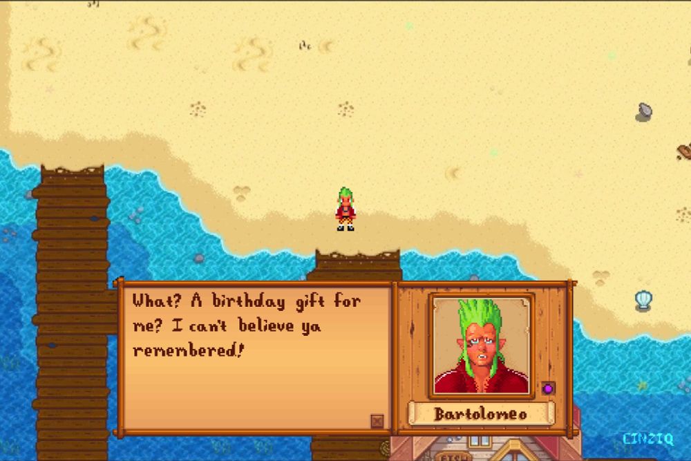 A fake screenshot of Stardew Valley's Pelican Beach. The screen is half pale sand at the top, and half blue ocean water at the bottom. Wooden docks lead away from the beach and a small fishing shack can be seen at the bottom of the screen. A sprite drawn to look like Bartolomeo from One piece stands at the center, looking directly at the viewer. A dialogue window is open at the bottom of the screen and drawn in the Stardew style. A pixel portrait on the right has been drawn to look like Barto, as well, with his name on the banner below. He looks teary-eyed while wearing his signature red coat. The text reads: What? A birthday gift for me? I can't believe ya remembered!