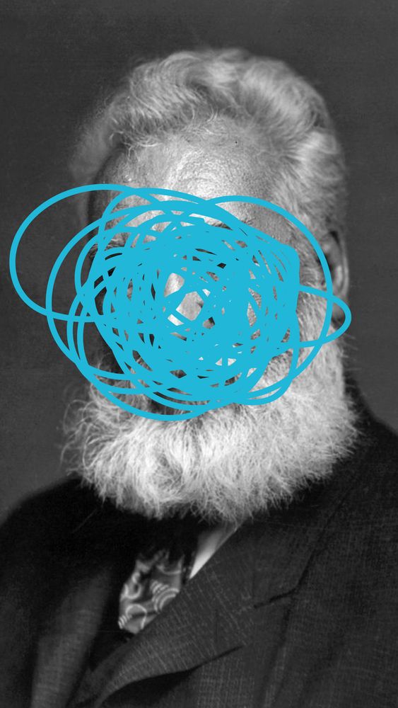 Black and white photo of a bearded man in a suit with his face scribbled out