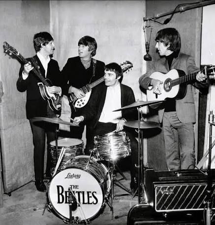 A 1964 shot of the Beatles on tour with some guy named Jimmie Nicol briefly filling in for Ringo, who was sick at home.