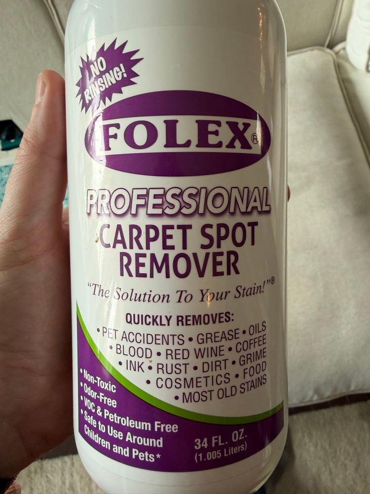 a bottle of Folex professional carpet spot remover