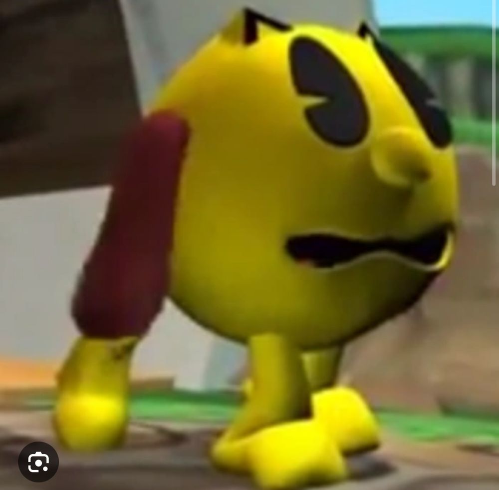 Tiny Pac-Person walking on four legs and has dog ears