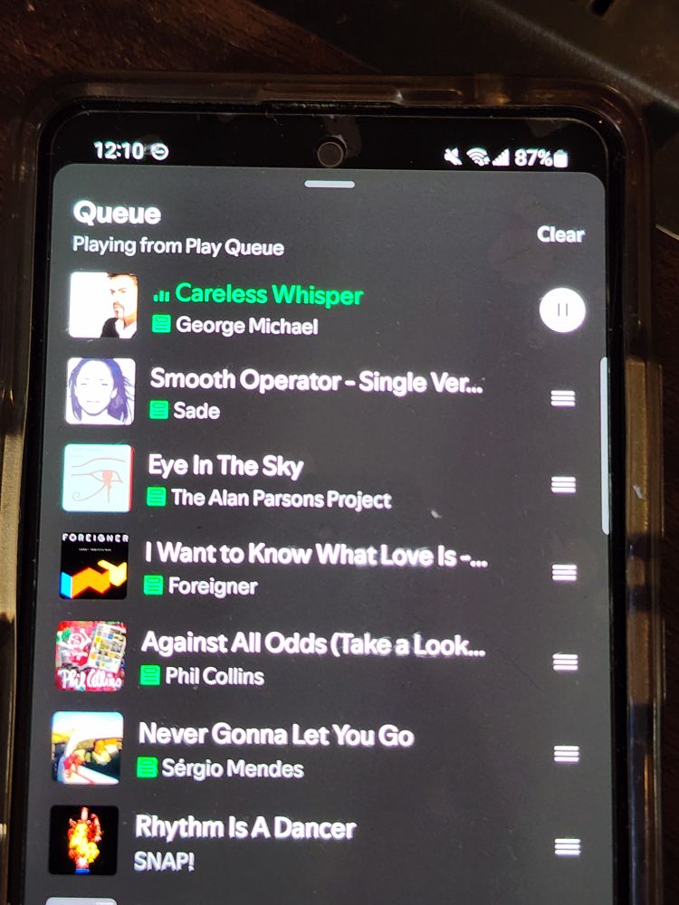 my Spotify queue with some more 80's ish era soft rock hits, and a 90's techno song after my queue
