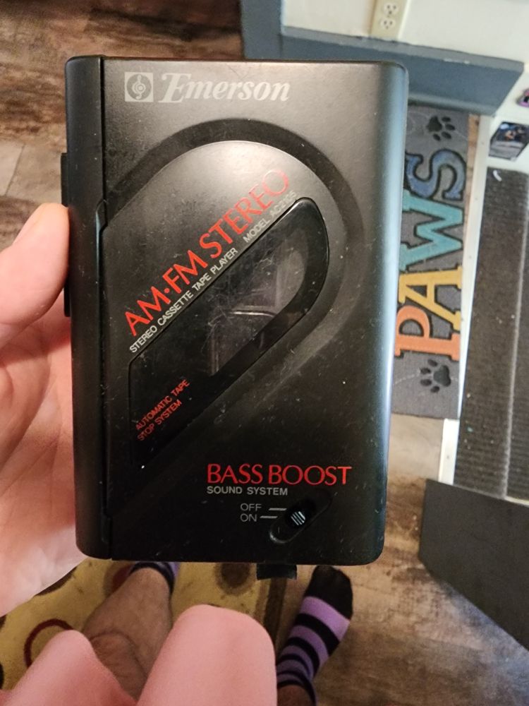 not a Sony Walkman, but an Emerson brand portable cassette tape player, with AM-FM stereo, and a bass boost switch!