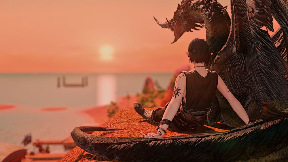 Vrtra (smaller) sitting next to Sidora as the two enjoy the sunset.