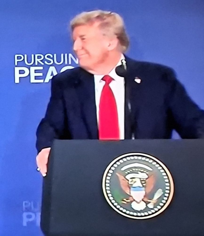 Trump looks at the russian dictator lovingly