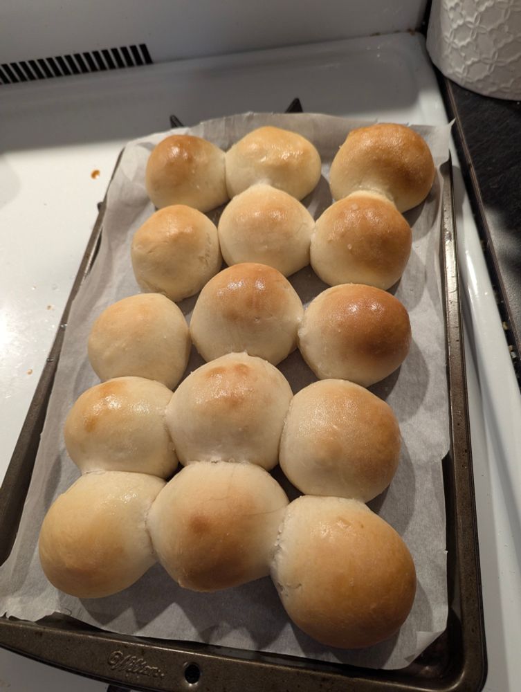 Fresh out the oven rolls perfected by a golden tint that my wife homemade 