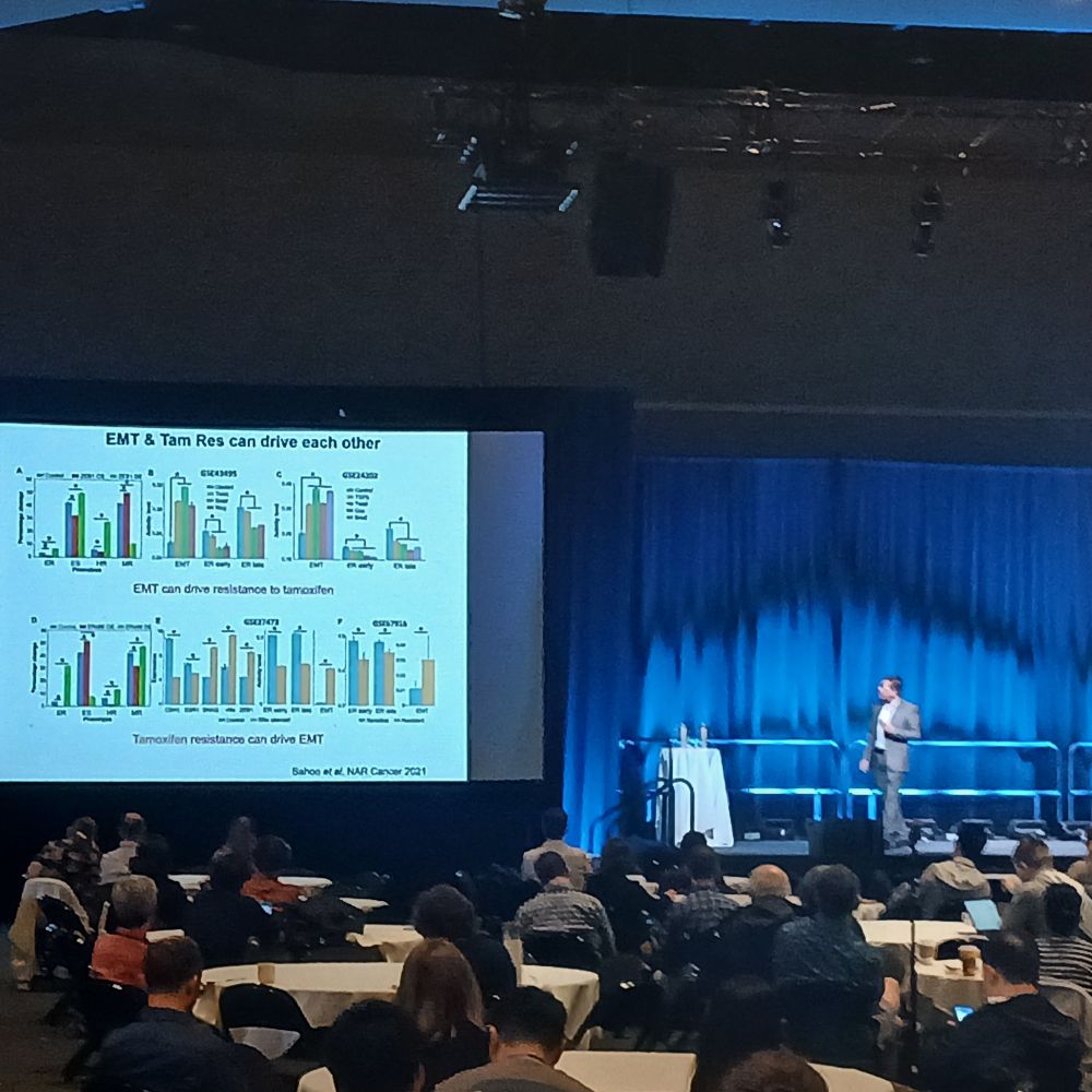 Photo of Moit Kumar Jolly presenting the Winfree Prize lecture.