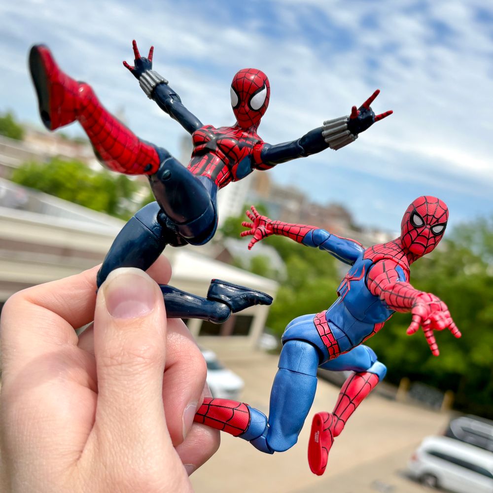 Marvel Legends figures of Spider-Girl (Mayday Parker) and Spider-Man (Tom Holland).