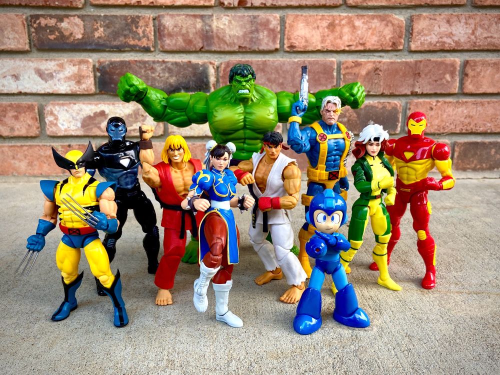 A collection of action figures from Jada Toys and Hasbro representing Marvel Vs Capcom 2.