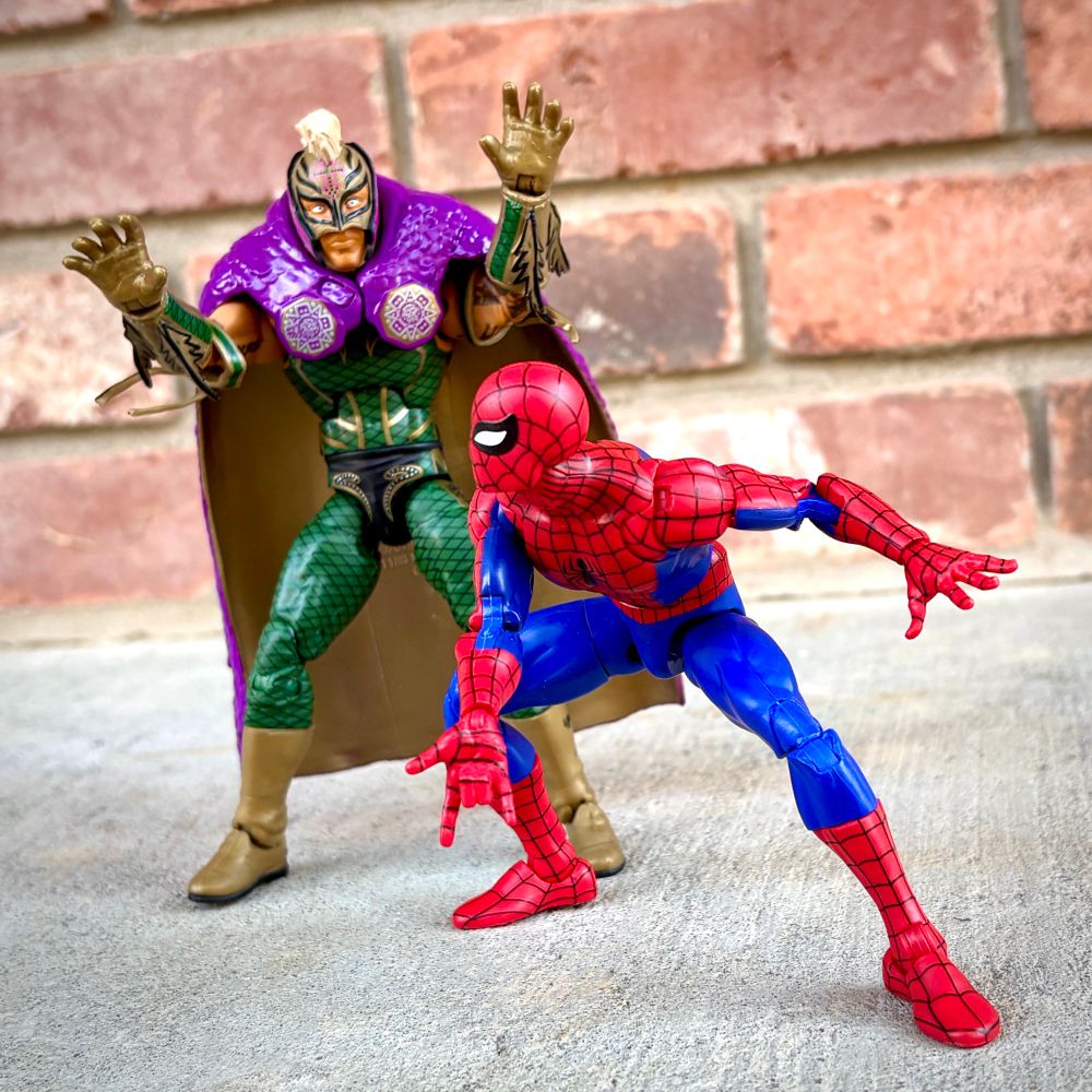 WWE Mattel Rey Mysterio as Marvel Comics villain Mysterio and Hasbro Marvel Legends Spider-Man and his Amazing Friends Spider-Man.