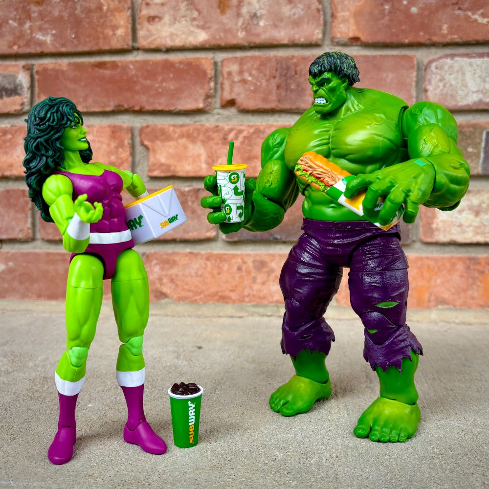 Photo of Marvel Legends Hulk and She-Hulk holding Subway restaurant food props from Mini Brands.