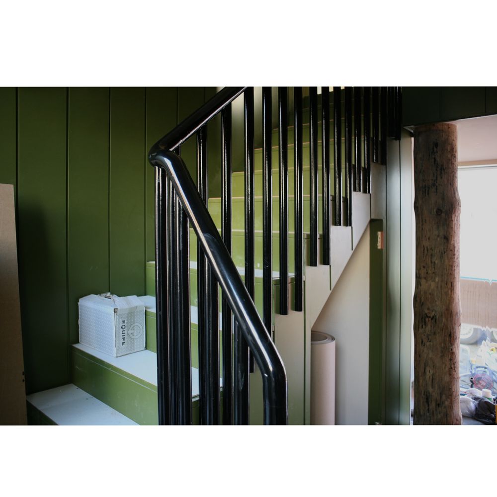 Photograph of colourful walls and staircase