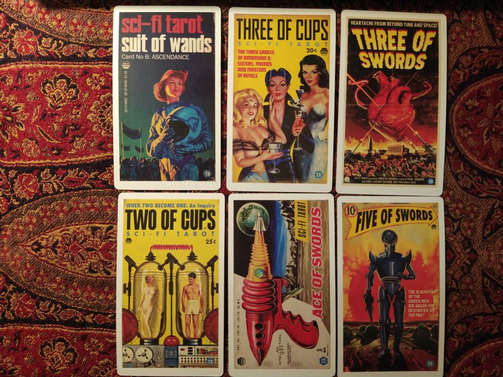 More cleverness continues in the card meanings sometimes being hinted at by the "book" taglines!
And of course how could I not share the cheekiness that is the visual pun of the "Three of Cups".