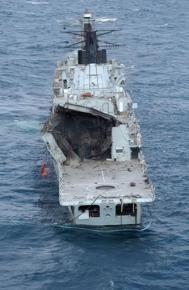 Royal Navy frigate HMS Boxer, after being hit by an anti ship missile during and exercise SINKEX, featuring a gaping hole in the back of the superstructure.
