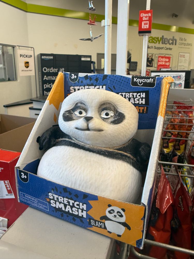 Panda toy that says stretch smash that looks very deflated and discolored