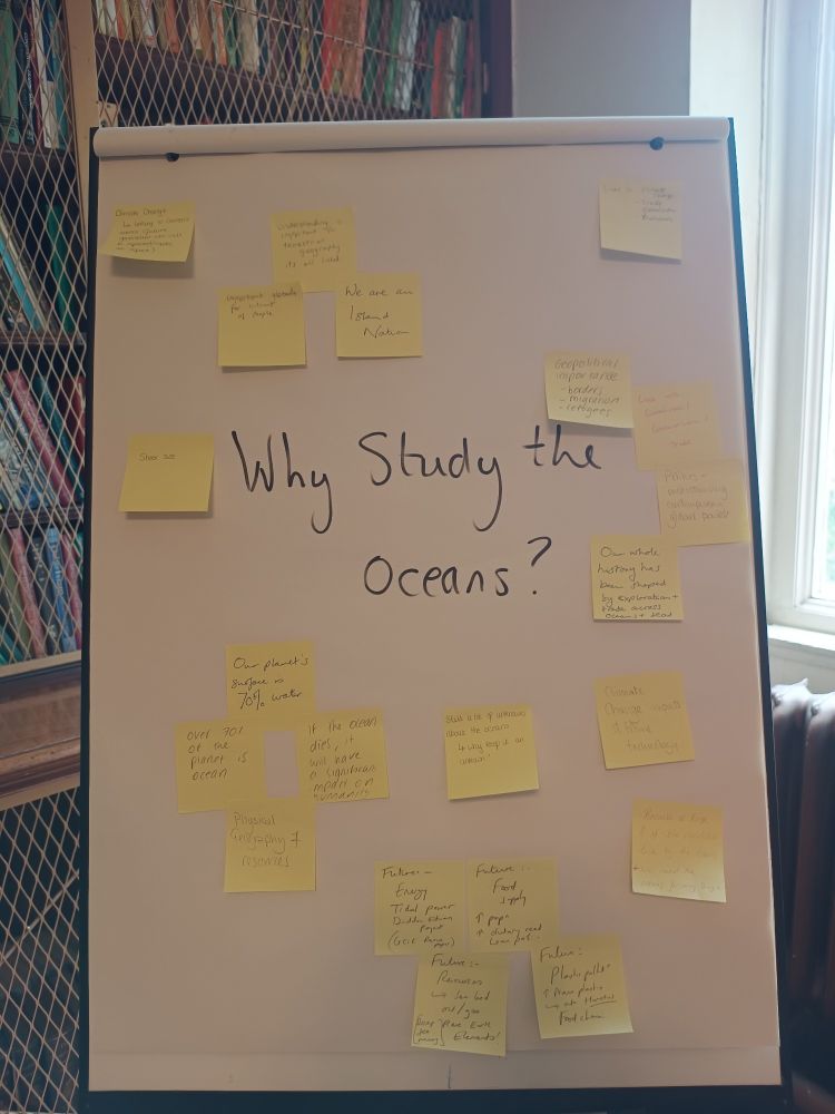 Flipboard with 'why study the oceans?' at the centre. Post it notes surround this with answers to the question from geography teachers 