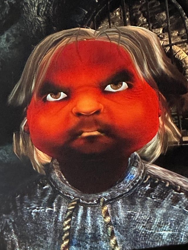 Un impérial (?) dans le menu de création de perso d'Oblivion. Il a une tête surgonflée et rouge comme une tomate 