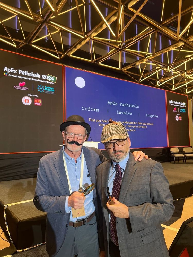 Roger Rodby and Joel Topf dressed as Watson and Holmes at the AKF Pathshala  
