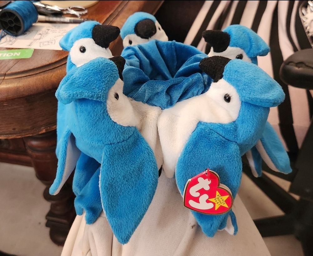 5 Rockets the beanie baby blue jay sewn front forward together with a velvety blue liner to make a bag, the ty tag still on one wing