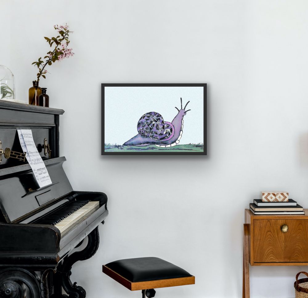 Framed art is shown in a display room.