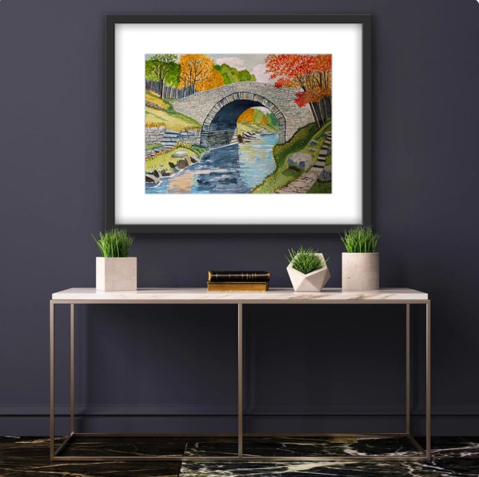 Framed art shown in display room.