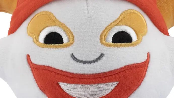Extreme close up of a Balatro-themed Joker soft toy