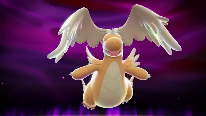 Pokémon Legends: Z-A screenshot showing mega evolution of Dragonite, an orange dragon with wings on its head