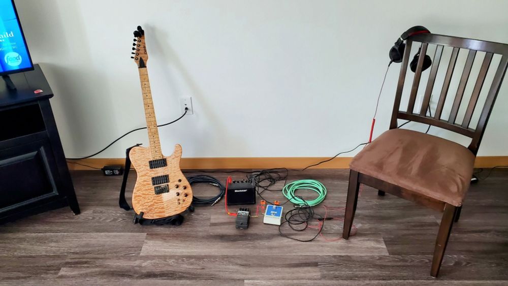 A quilted maple Carvin guitar in a Tele body style 