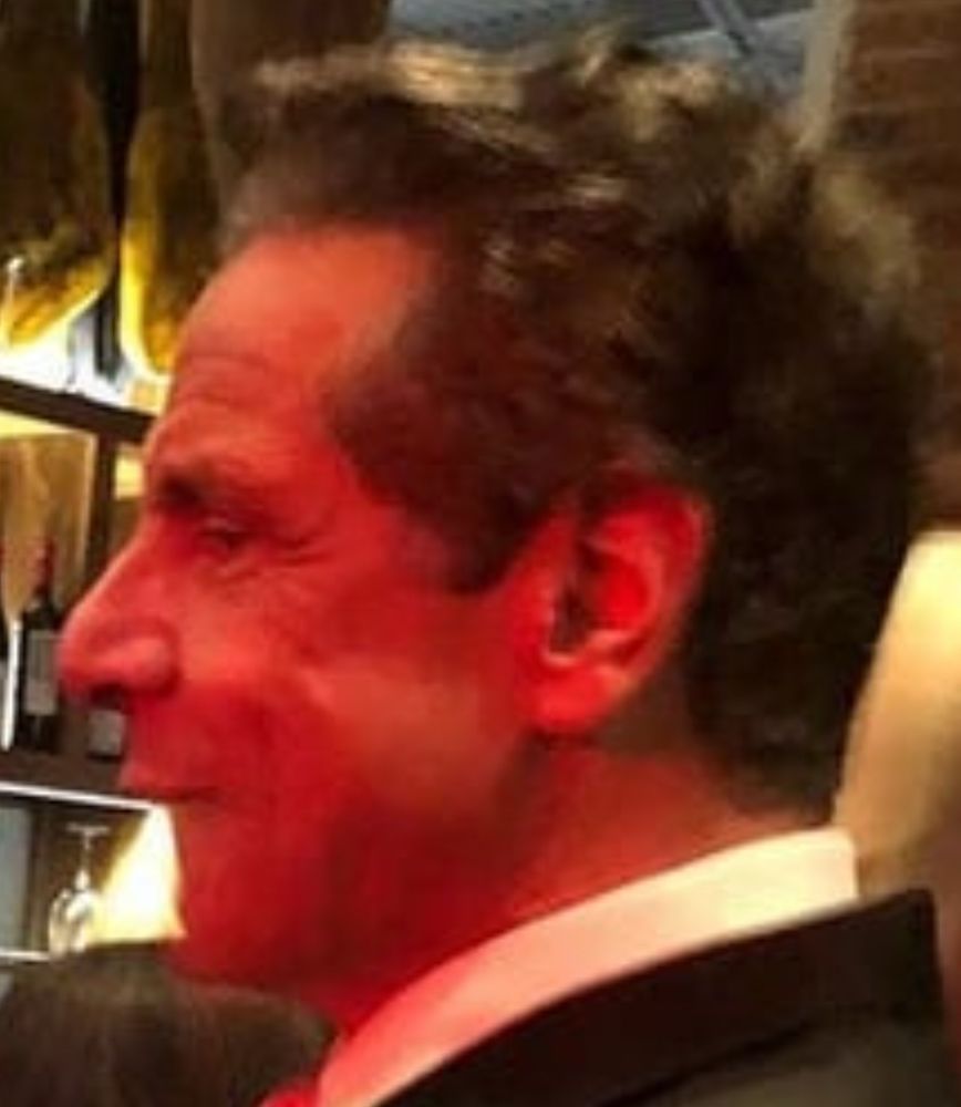 Cuomo doing a weird shape with his lips 