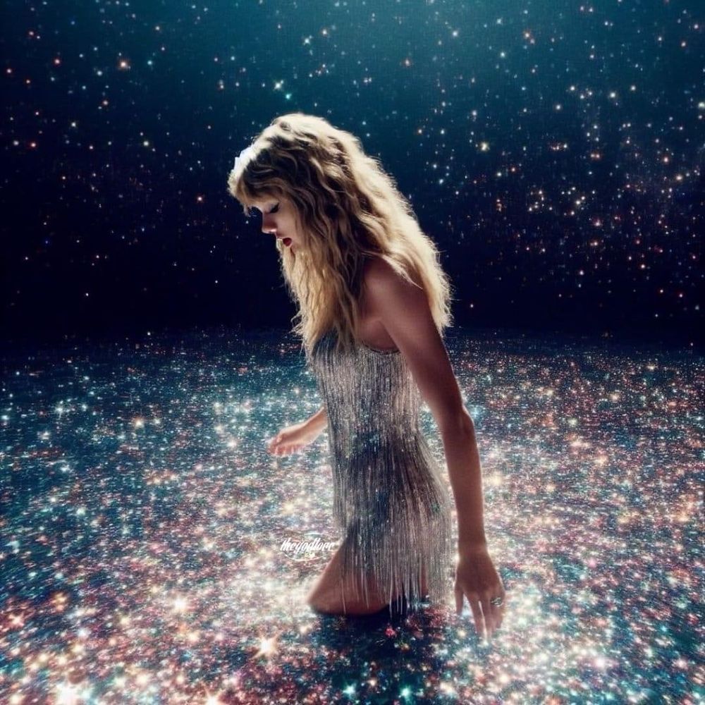 An artistic depiction of Taylor Swift walking through a sea a glitter, she is walking to the left hand side of the frame with one hand by her waist and the other by her side. she is wearing a silvery glitter dress