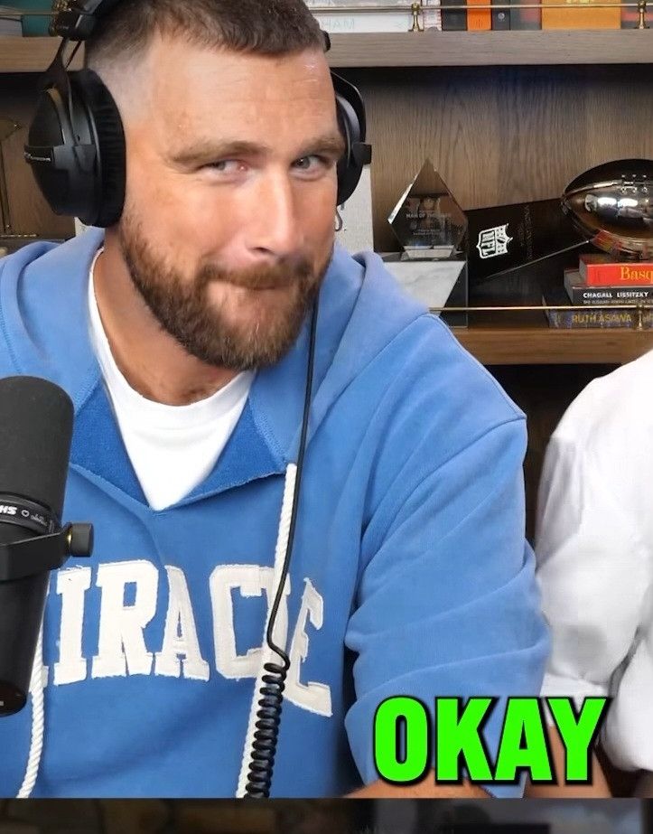 Travis Kelce makes a silly face toward the camera while saying OK