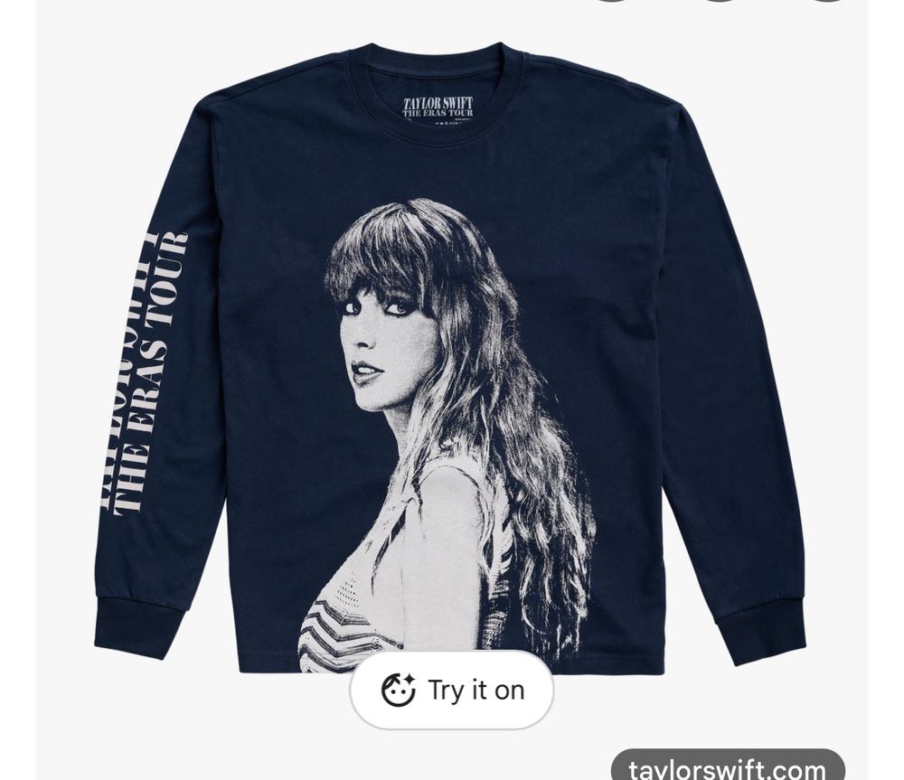 Taylor Swift merchandise navy blue sweater with Taylor Swift, the eras tour on the sleeve and midnights Taylor on the front