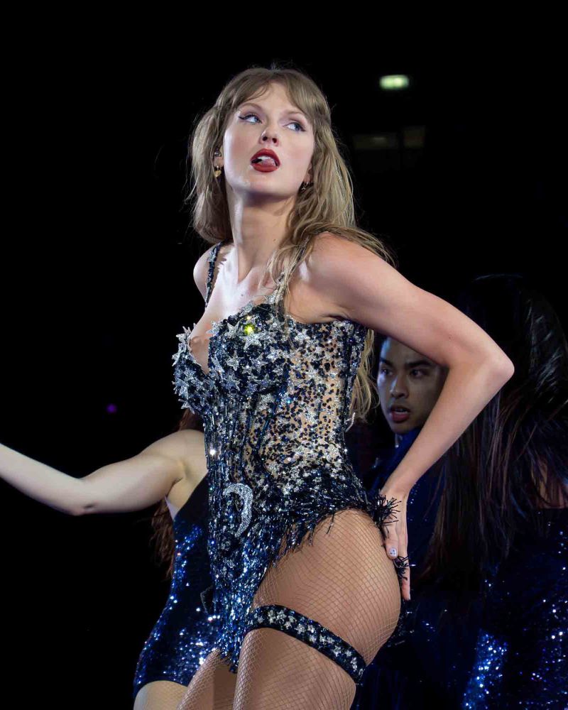 Taylor Swift poses in her moonstone bodysuit