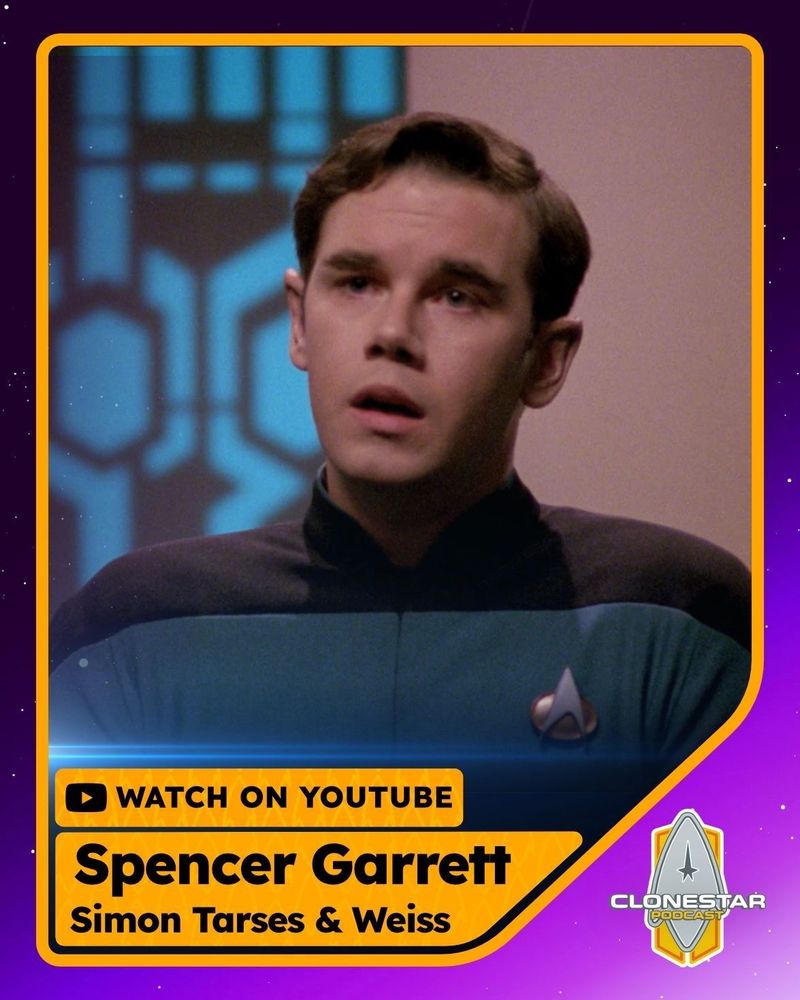 A promotional image for The CloneStar Podcast featuring actor Spencer Garrett as Ensign Simon Tarses from Star Trek: The Next Generation. He’s wearing a classic Starfleet science and medical division uniform with the teal and black color pattern and the silver Starfleet insignia badge on his chest. His expression is serious and reflective, illuminated by soft lighting with a geometric Starfleet-style backdrop behind him. The design is framed in a bright orange border over a deep purple space background sprinkled with tiny stars. At the bottom, a golden panel reads: “📺 WATCH ON YOUTUBE” and below that, in bold black text, “Spencer Garrett – Simon Tarses & Weiss.” In the lower right corner is the CloneStar Podcast logo featuring a silver starship delta over a yellow shield with the podcast name in futuristic lettering. The overall tone is bright, cinematic, and Trek-inspired, celebrating Garrett’s iconic roles and the podcast’s latest interview episode.