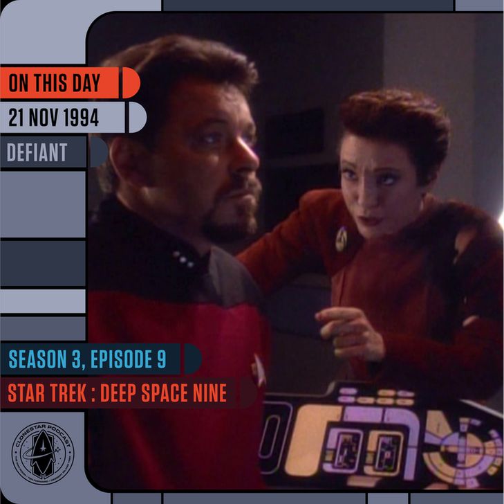 A dramatic moment from Star Trek: Deep Space Nine shows a man in a red-and-black Starfleet uniform staring intently ahead, illuminated by dim bridge lighting. Beside him, a Bajoran woman in a red uniform leans in urgently, her expression tense and focused as she speaks. They are positioned over a glowing LCARS control panel filled with colorful readouts. The scene is framed in an LCARS-style layout. Text on the left reads: “On This Day — 21 Nov 1994 — Defiant.” Along the bottom, additional panels say: “Season 3, Episode 9 — Star Trek: Deep Space Nine,” with the CloneStar Podcast logo in the corner.