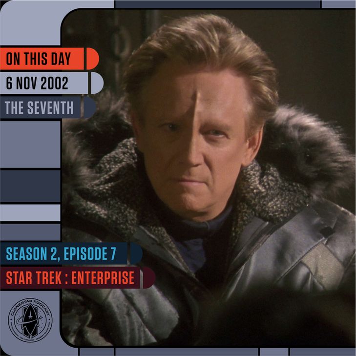 A man with short blond hair and a pronounced forehead ridge wears a heavy fur-lined jacket, standing in a dimly lit room. His expression is tense and guarded. The LCARS-style frame reads: “On This Day — 6 Nov 2002 — The Seventh” and “Season 2, Episode 7 — Star Trek: Enterprise.” The CloneStar Podcast logo appears in the corner.