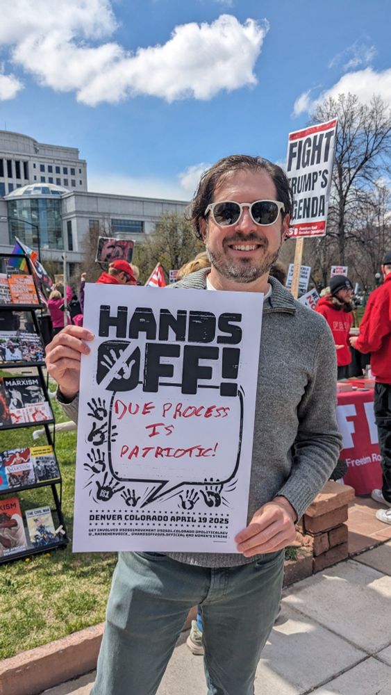 Me holding a Hands Off sign with hand-written text "Due process is patriotic"